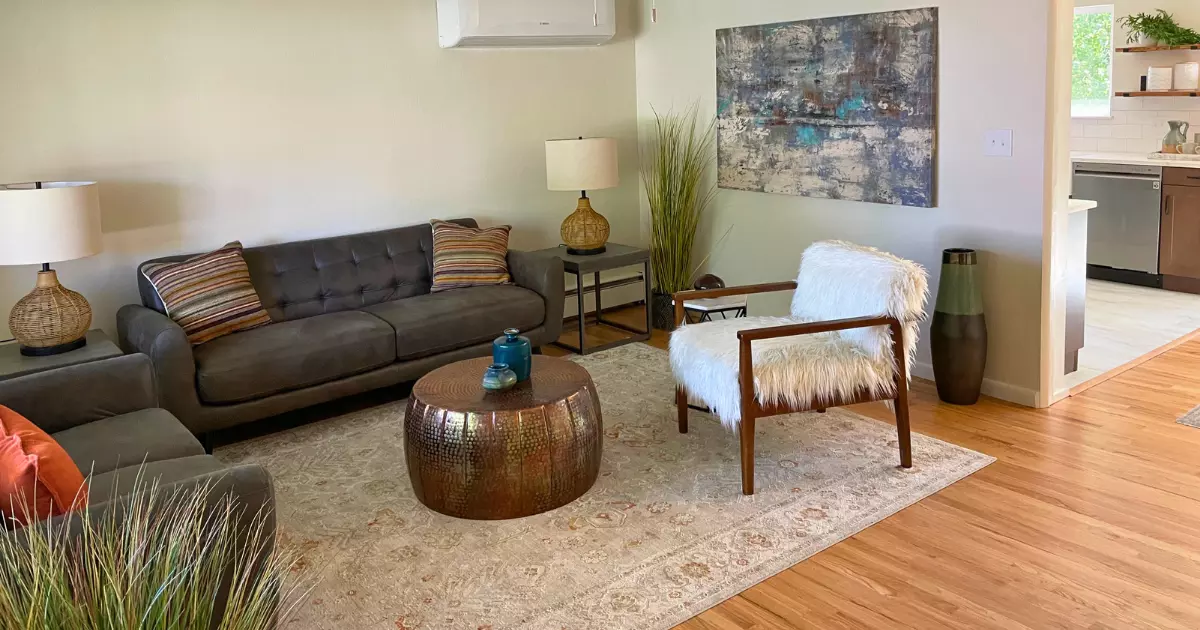 A living room with a couch and a coffee table